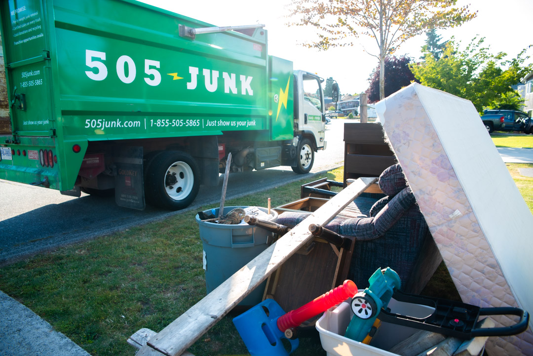 A pile of junk outside a home during a hoarding removal in North Vancouver.