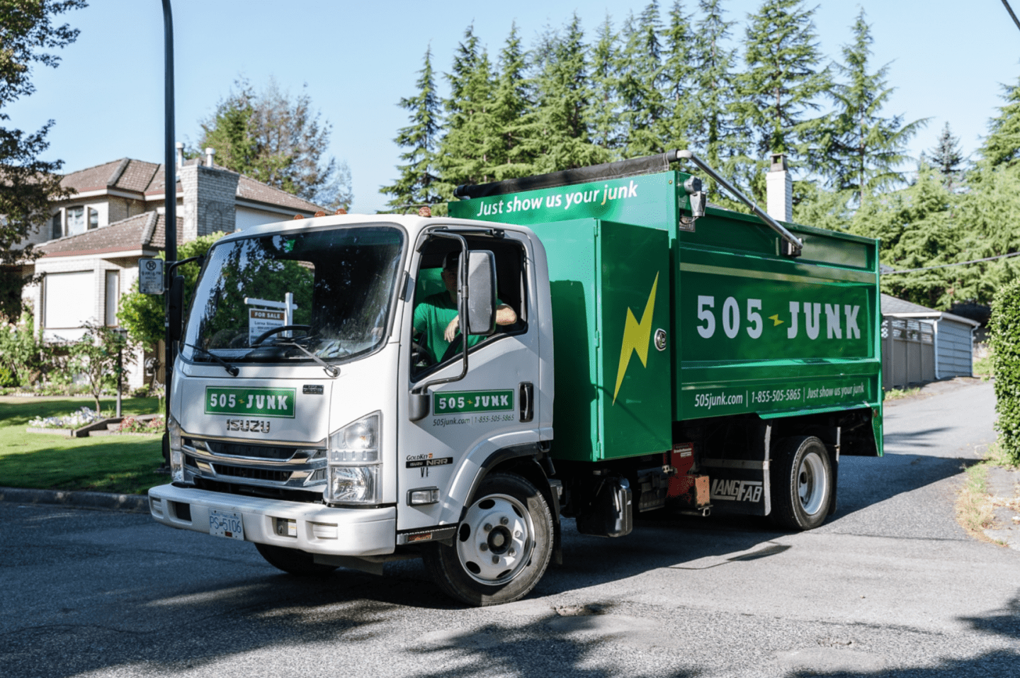 Best Junk Removal in Vancouver - 505-Junk pulling out of an alley.