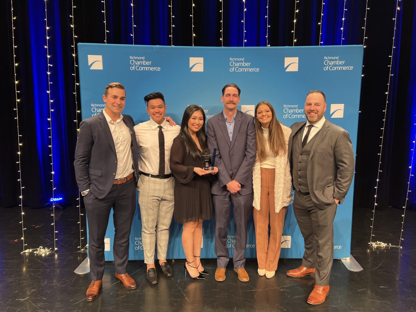 The 505-Junk team accepting the Mid-Size Business of the Year award at the Richmond Chamber of Commerce Business Excellence Awards Gala.